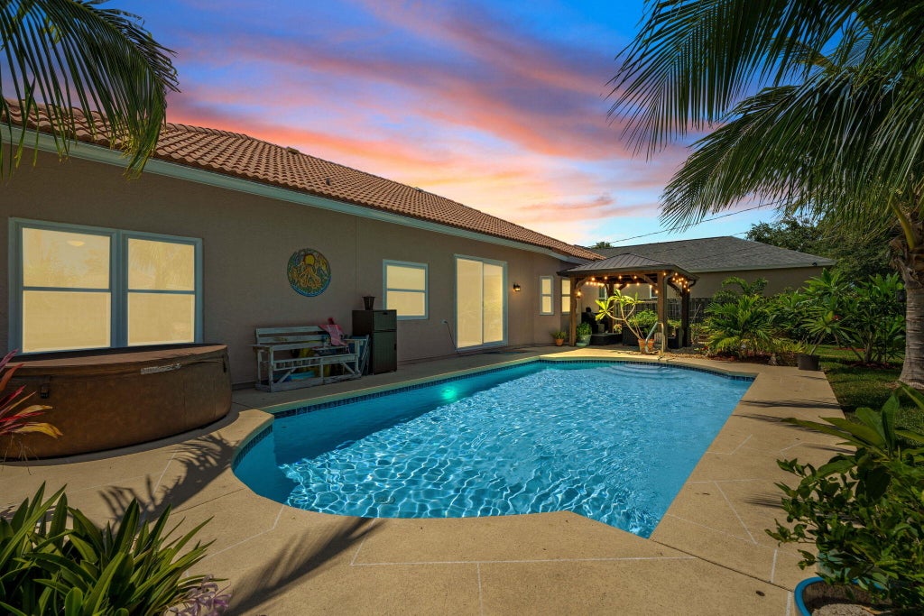Photo of 2051 SW Pruitt Street, Port Saint Lucie, FL 34953 (MLS # R11100417)