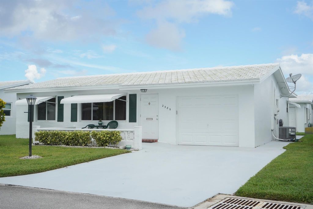 Photo of 2389 SW 13th Terrace, Boynton Beach, FL 33426 (MLS # R11126338)