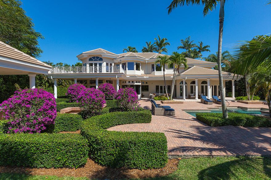 Grand two story estate home perfectly situated on over 3/4 acre lot in the heart of Palm Beach Polo. The layout lends itself to entertaining and everyday living inside and out. Exquisite renovations including kitchen, wood floors, Cypress tongue and groove ceilings, new roof and more.The property features a resort style pool area including sauna, spa, cabana bar and grill and basketball court. Sweeping views of the water and golf course are visible from all indoor and outdoor spaces. Professionally decorated and sold furnished/turnkey.