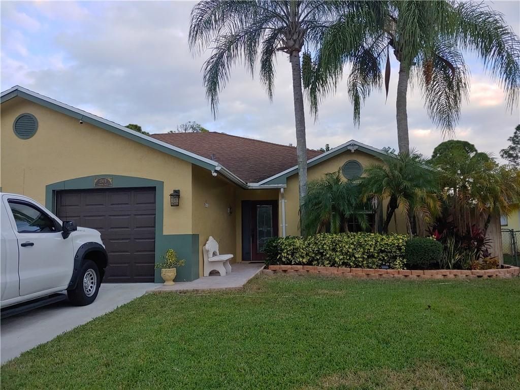Photo of 156 Sparrow Dr, Royal Palm Beach, FL 33411 (MLS # F10262602)