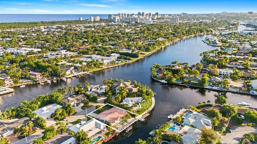 Exquisite waterfront retreat in the esteemed gated Bal Harbour. This single-level dream home feels like new construction. Two private ensuite wings, all 4 bedrooms with king beds, complemented by elegant Italian flooring throughout. The chef’s kitchen boasts a 10' ceiling, custom cabinetry, a gas range, and a stunning Caesarstone waterfall island. Expansive sliders create seamless indoor-outdoor living, opening to a covered firepit lounge. 
Indulge in a saltwater pool with fireplace, outdoor shower, and magnificent Sylvester Palms. Private dock w' boat lift offers ocean access via Middle River’s single fixed bridge. A two-car garage, indoor laundry, street-gas and updated electric & plumbing. Conveniently located by Whole Foods, Publix & Trader Joe's and minutes to the beach and airport.