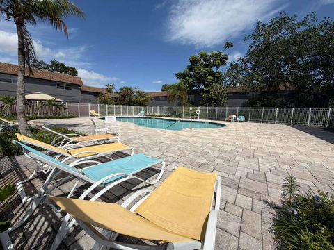 Photo of 4869 NW 9th Drive #4869, Plantation, FL 33317 (MLS # B26015581)
