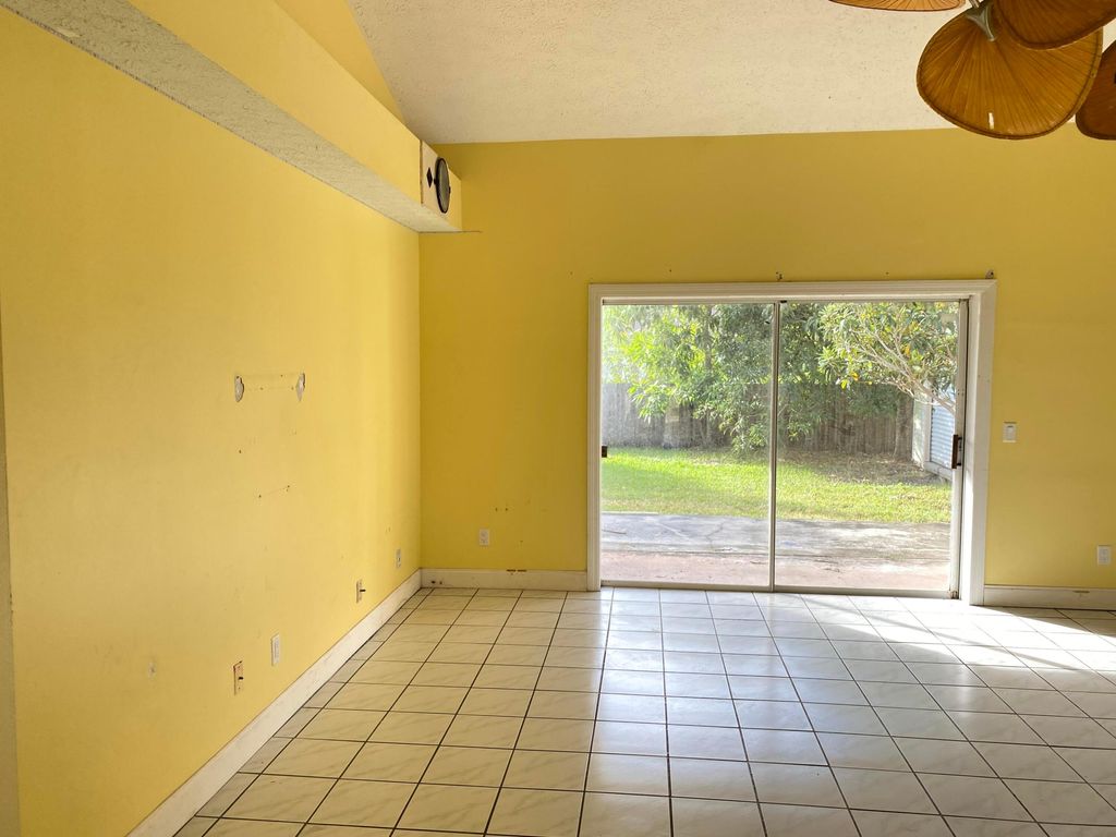 Photo of 3204 SE Quay Street, Port Saint Lucie, FL 34984 (MLS # R11012657)