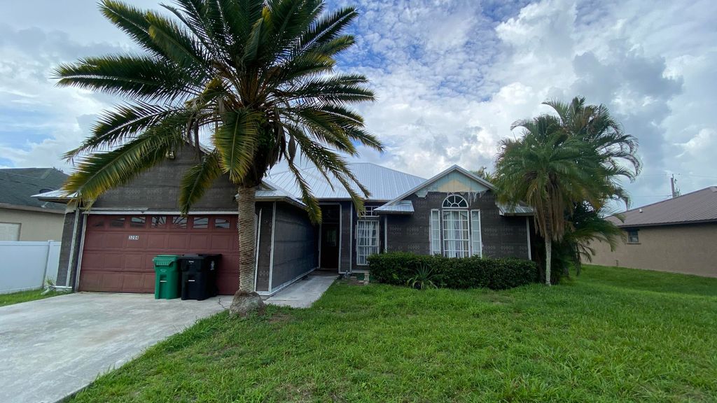 Photo of 3204 SE Quay Street, Port Saint Lucie, FL 34984 (MLS # R11012657)