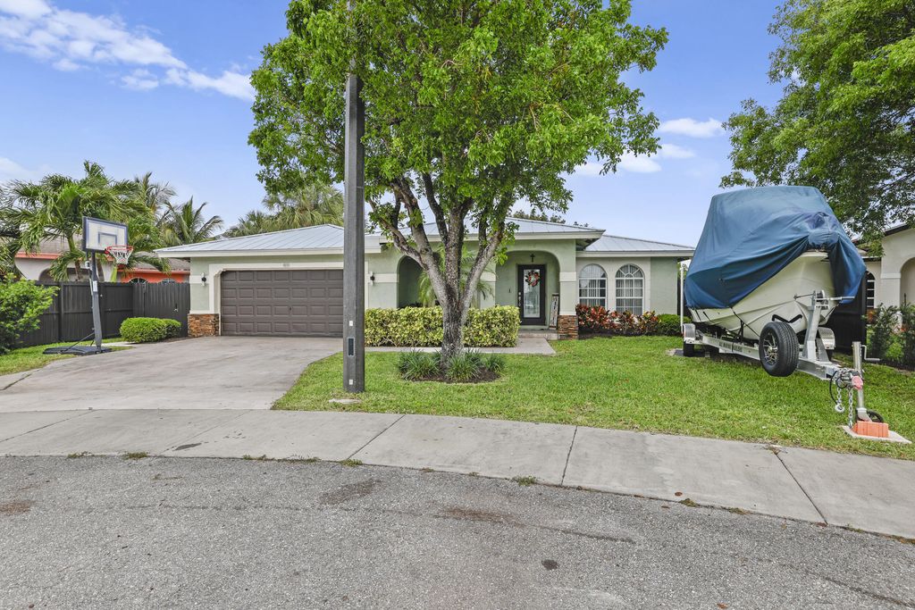 Photo of 401 NW 16th Place, Pompano Beach, FL 33060 (MLS # B26024299)