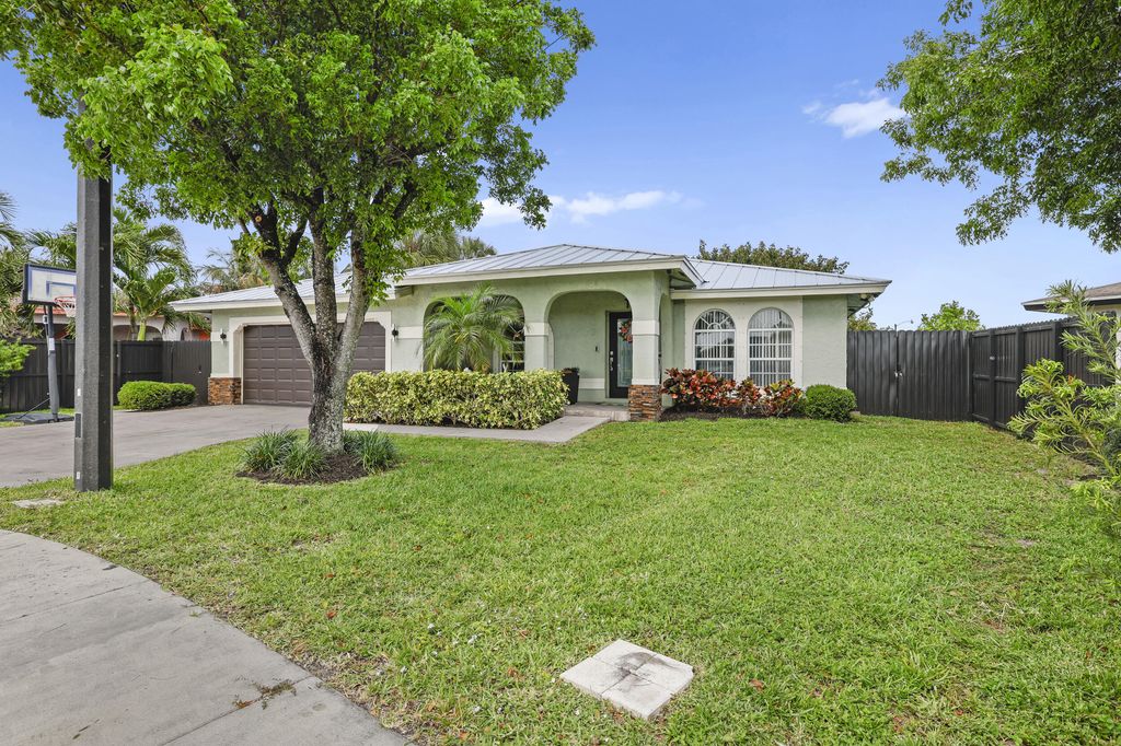 Photo of 401 NW 16th Place, Pompano Beach, FL 33060 (MLS # B26024299)