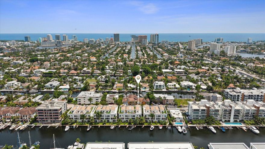 Experience luxury waterfront living in this impeccably maintained townhouse with private slip for 65’(+-)vessel and direct ocean access (no fixed bridges). Beautifully renovated featuring 4 ensuite bedrooms, gourmet kitchen w/ high-end appliances, spacious primary suite w/ dual walk-ins, loft, den, elevator and 2-car garage. Enjoy water views from 3 balconies and a rooftop terrace. Features impact windows/doors, marble & wood floors, new A/C, upgraded marble-concrete underlay driveway/patios/walkways/rooftop wood ceilings, custom lighting, fans and commercial-grade Wi-Fi/security. With more upgrades than can be mentioned, this home offers an unmatched blend of elegance and convenience, just a short walk to Ft. Lauderdale Beach, fine dining, boutique shopping and vibrant Las Olas nightlife.