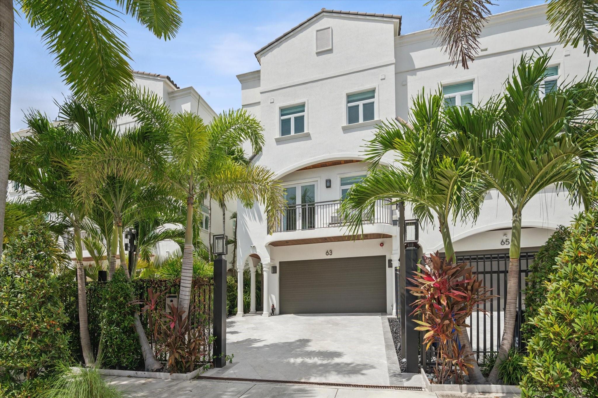 Experience luxury waterfront living in this impeccably maintained townhouse with private slip for 65’(+-)vessel and direct ocean access (no fixed bridges). Beautifully renovated featuring 4 ensuite bedrooms, gourmet kitchen w/ high-end appliances, spacious primary suite w/ dual walk-ins, loft, den, elevator and 2-car garage. Enjoy water views from 3 balconies and a rooftop terrace. Features impact windows/doors, marble & wood floors, new A/C, upgraded marble-concrete underlay driveway/patios/walkways/rooftop wood ceilings, custom lighting, fans and commercial-grade Wi-Fi/security. With more upgrades than can be mentioned, this home offers an unmatched blend of elegance and convenience, just a short walk to Ft. Lauderdale Beach, fine dining, boutique shopping and vibrant Las Olas nightlife.
