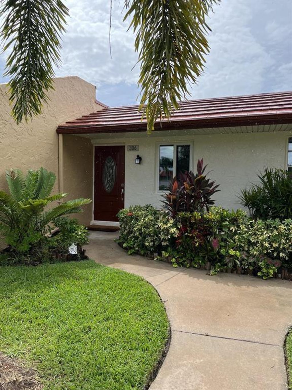 Photo of 306 Lake Helen Drive, West Palm Beach, FL 33411 (MLS # F10489990)