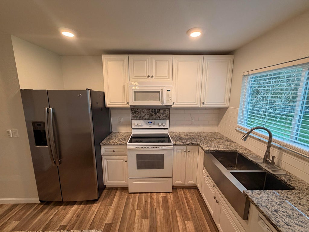 Photo of 286 SW Kentwood Road, Port Saint Lucie, FL 34953 (MLS # B26074442)