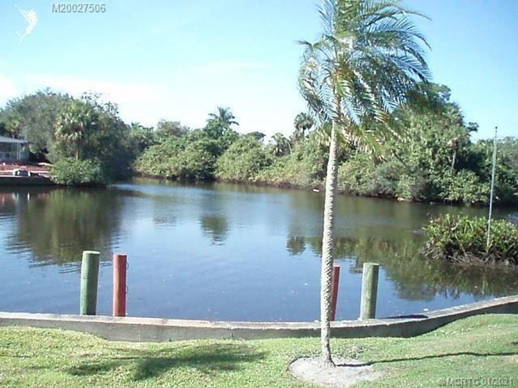Photo of 7660 SE Fork River Drive, Stuart, FL 34997 (MLS # R10921363)