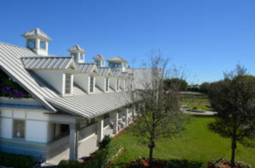 Location! State-of-the-Art Custom 18-stall barn just steps from WEF and FEI. One of the best, front row locations of Grand Prix Village--rarely available! This barn was built and completed in 2012 with all high-end finishes throughout. The barn features two grand tack rooms, one office, one storage room, and six grooming stalls and wash stalls. The premises also include four paddocks and a fabulous ring with GGT footing. A custom two-bedroom and two full bath owners or managers apartment sits above the garage providing exceptional views of the entire property.