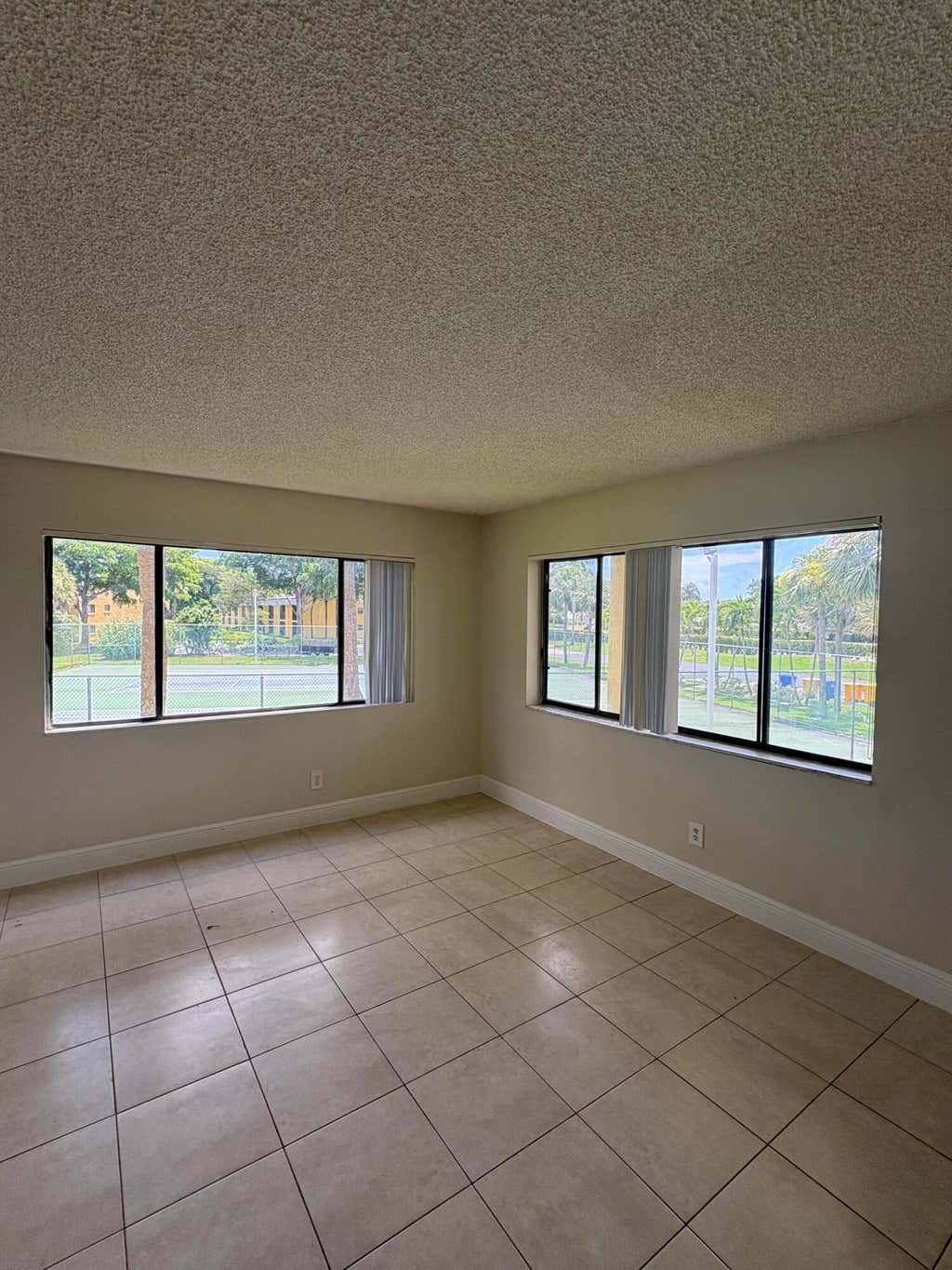 Photo of 1437 MEADOWS Circle W #1437, Boynton Beach, FL 33436 (MLS # B26064594)