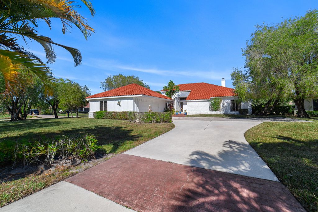 Photo of 3000 Conifer Drive, Fort Pierce, FL 34951 (MLS # R11158912)