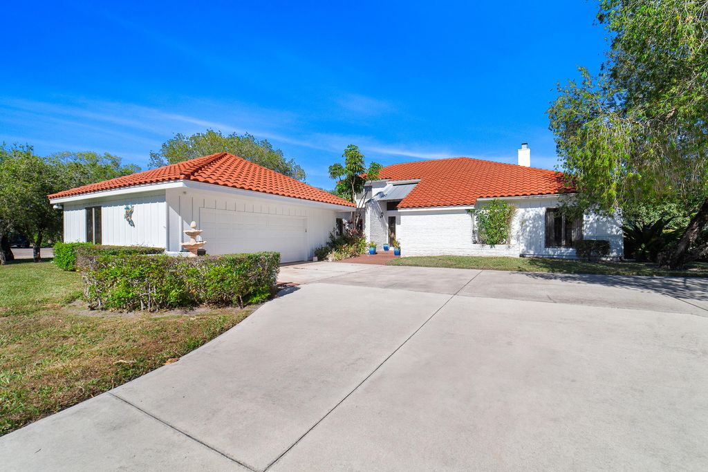 Photo of 3000 Conifer Drive, Fort Pierce, FL 34951 (MLS # R11158912)