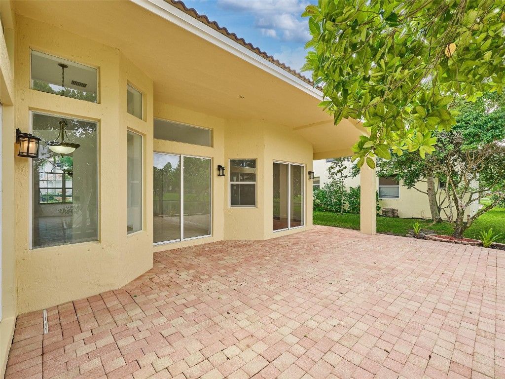 Photo of 7127 Pinecreek Way, Coconut Creek, FL 33073 (MLS # F10543020)