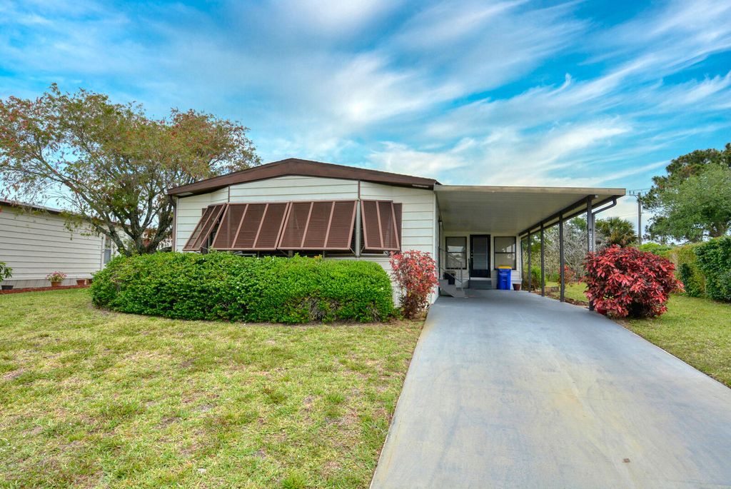 Photo of 7717 SE Continental Drive, Hobe Sound, FL 33455 (MLS # R10791424)