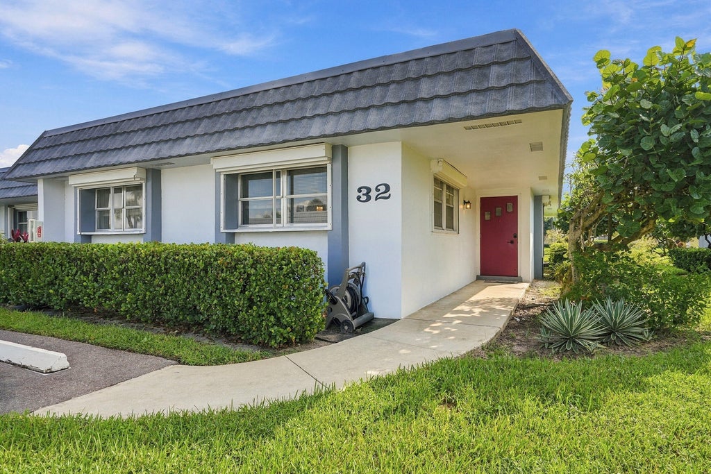 Photo of 2886 FERNLEY Drive E #32, West Palm Beach, FL 33415 (MLS # B26087389)