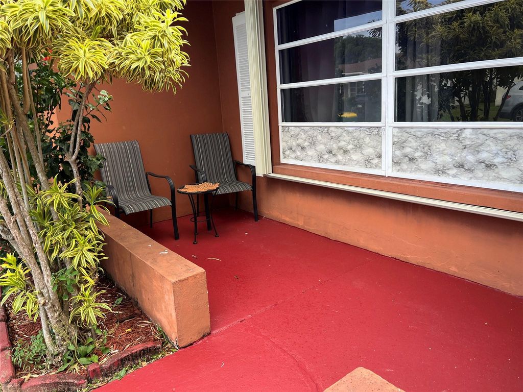 Photo of 6105 NW 73rd Ave, Tamarac, FL 33321 (MLS # F10517948)