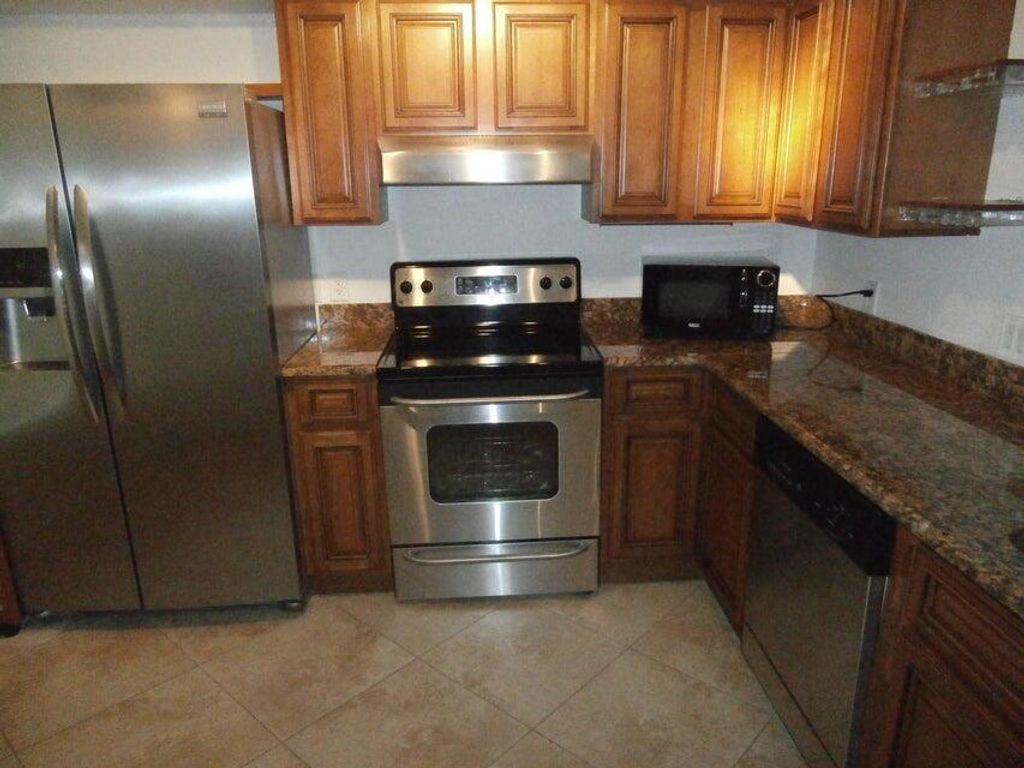 Photo of 103 Yacht Club Way #102, Hypoluxo, FL 33462 (MLS # R11056097)