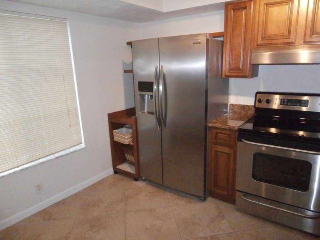 Photo of 103 Yacht Club Way #102, Hypoluxo, FL 33462 (MLS # R11056097)