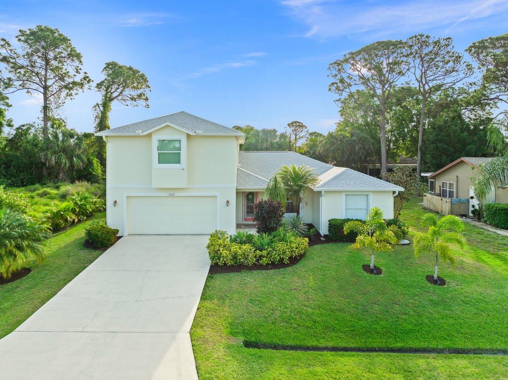 Photo of 1707 SE Manth Lane, Port Saint Lucie, FL 34983 (MLS # R10972794)