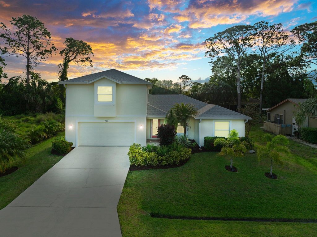 Photo of 1707 SE Manth Lane, Port Saint Lucie, FL 34983 (MLS # R10972794)