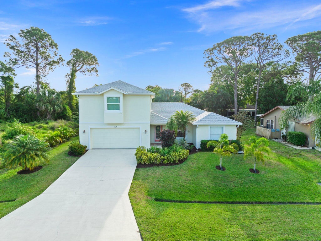 Photo of 1707 SE Manth Lane, Port Saint Lucie, FL 34983 (MLS # R10972794)
