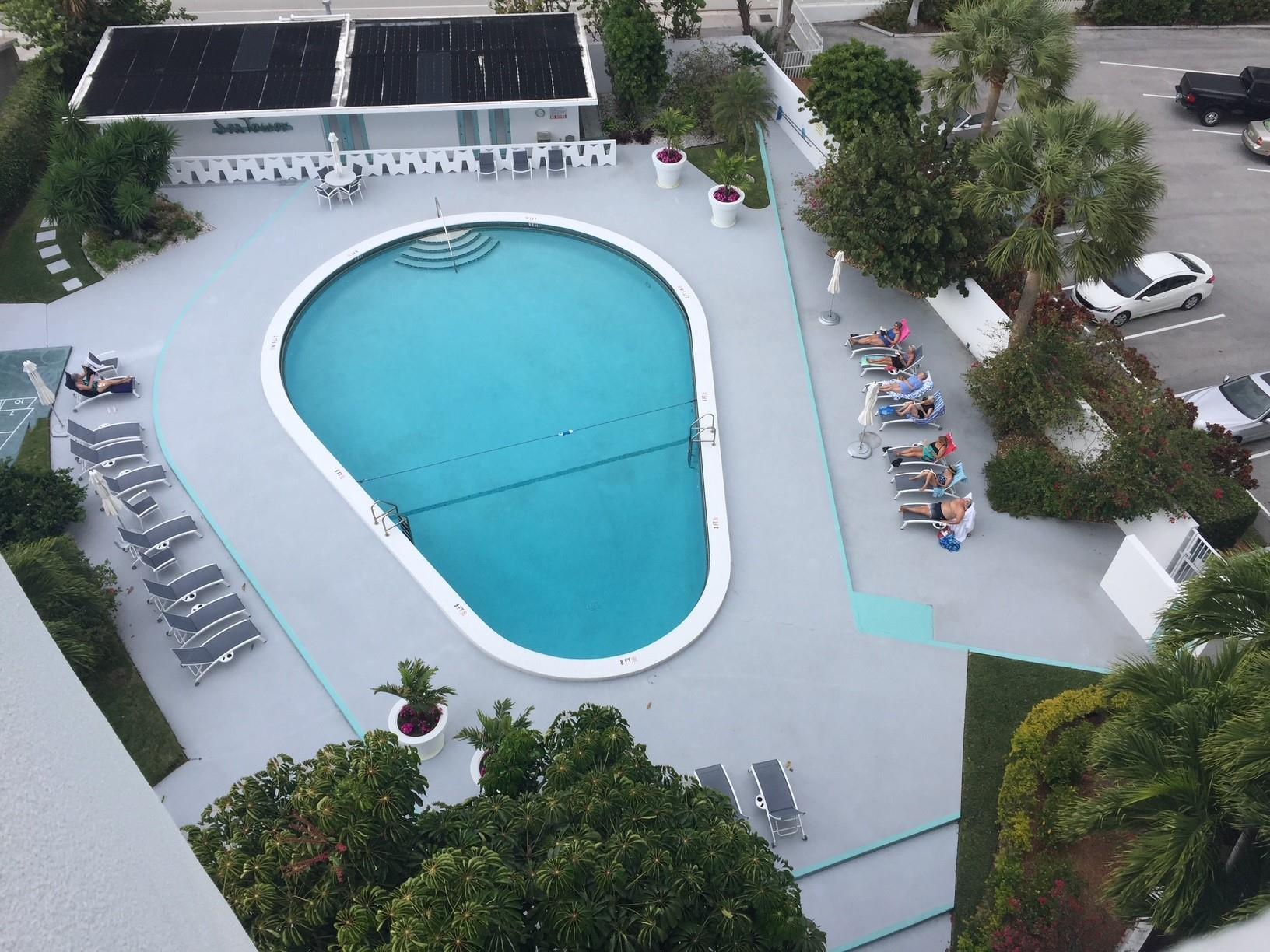 Your own beach retreat for under $400,000. East of A1A in a quiet residential neighborhood. Spacious open living area. Floor to ceiling windows for natural light and southeast breezes. Steps to shopping, nightlife, restaurants. Concrete restoration complete. 55+ community.