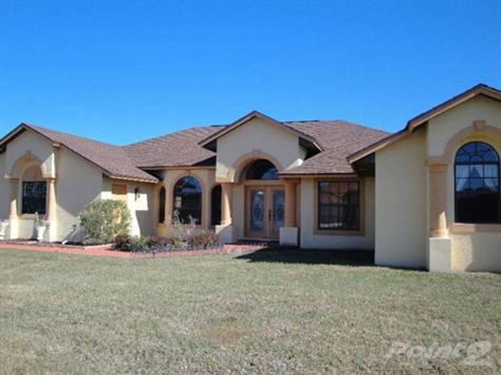 Photo of 5805 NW Zinnia Street, Port Saint Lucie, FL 34986 (MLS # R10975508)