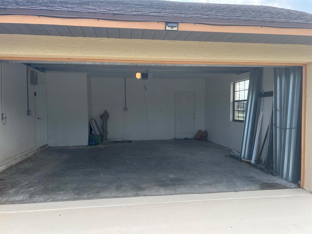 Photo of 5805 NW Zinnia Street, Port Saint Lucie, FL 34986 (MLS # R10975508)