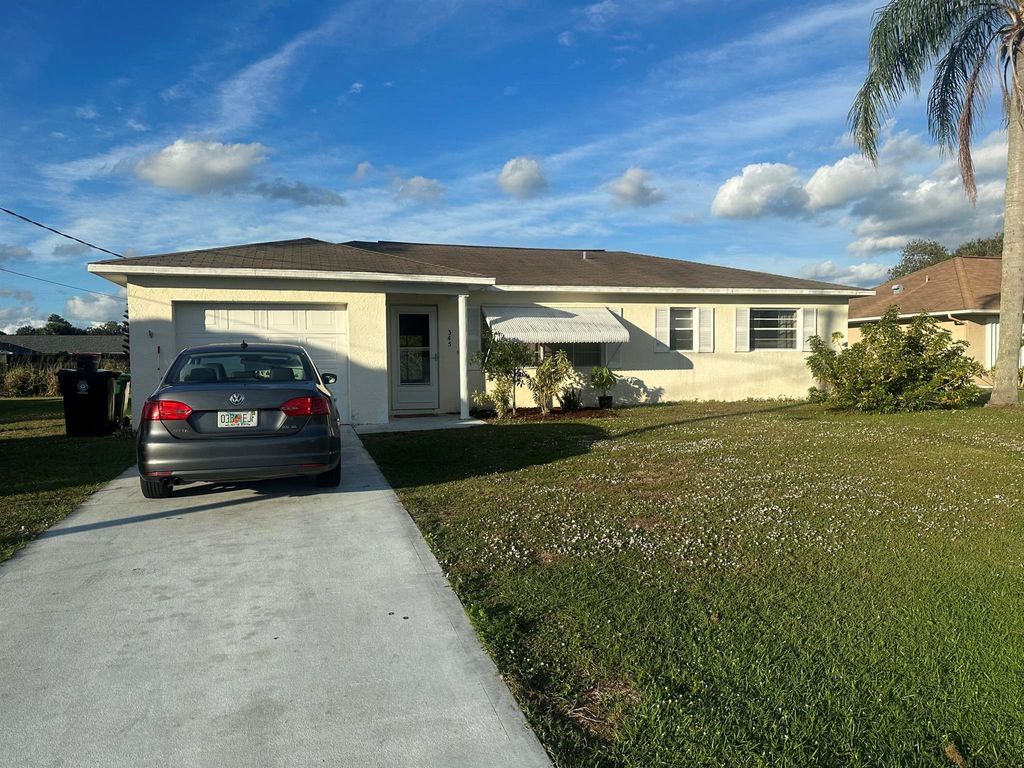 Photo of 345 NW Marion Avenue, Port St Lucie, FL 34983 (MLS # R10937614)