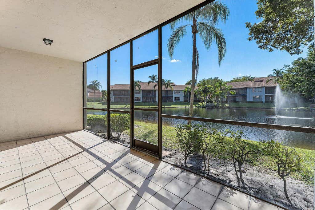 Photo of 5581 Coach House Circle #B, Boca Raton, FL 33486 (MLS # R11057220)