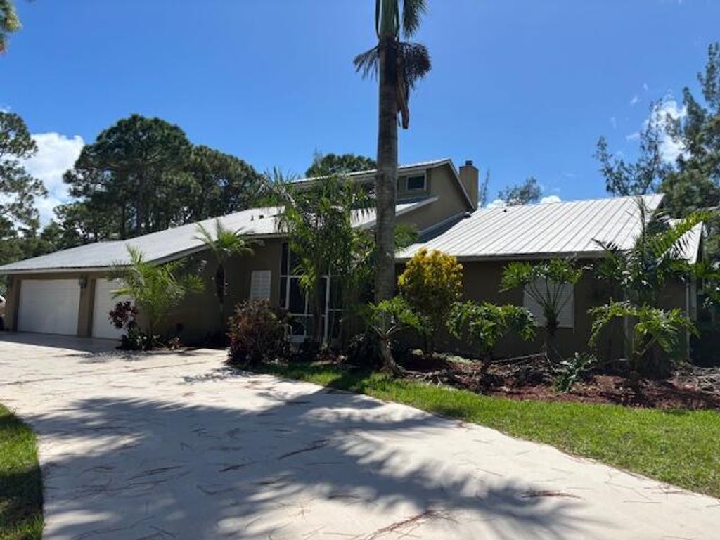 Photo of 12404 N 88th Place N, The Acreage, FL 33412 (MLS # R11135643)