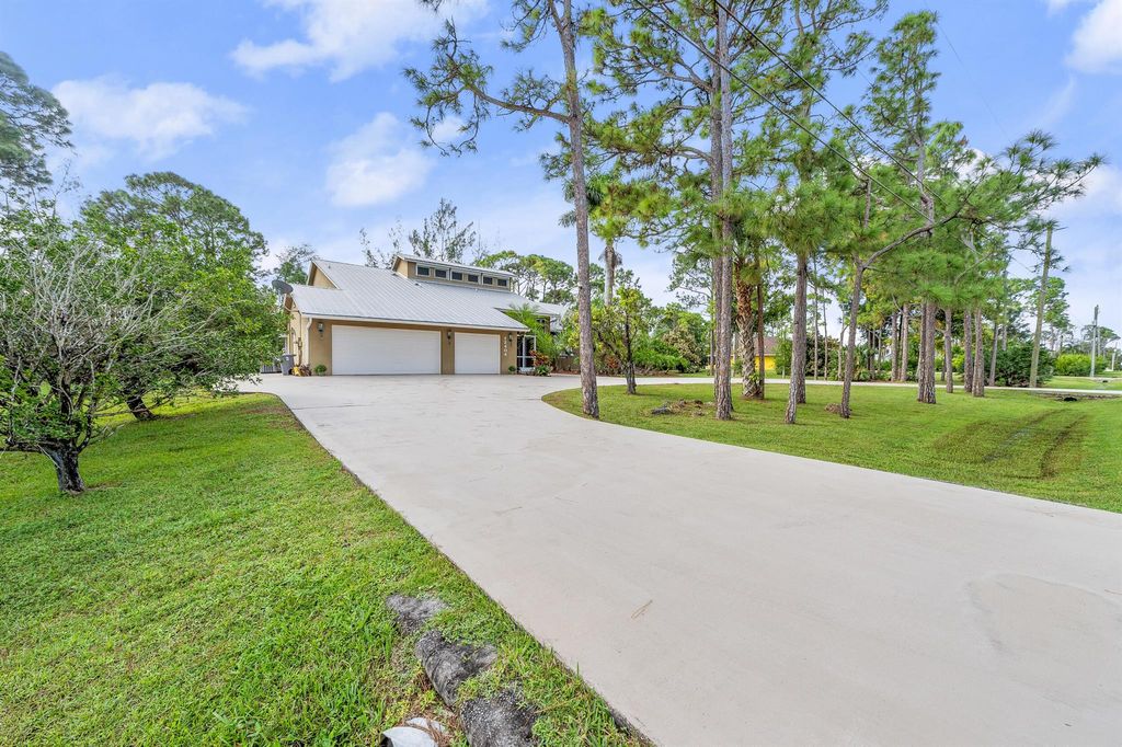Photo of 12404 N 88th Place N, The Acreage, FL 33412 (MLS # R11135643)