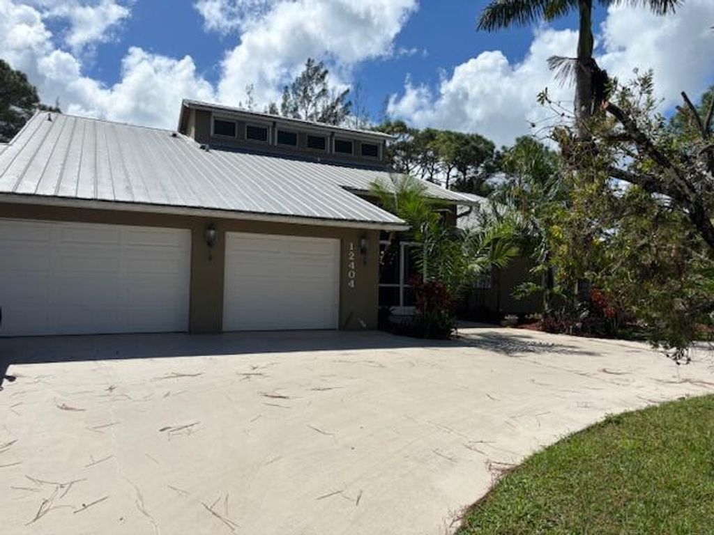 Photo of 12404 N 88th Place N, The Acreage, FL 33412 (MLS # R11135643)