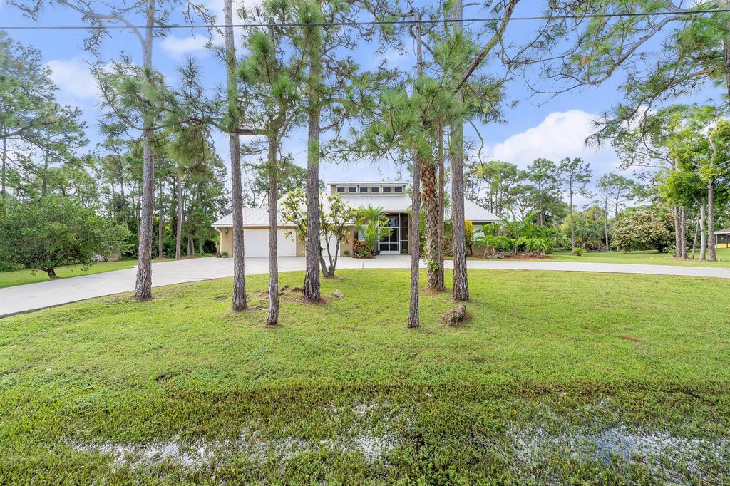 Photo of 12404 N 88th Place N, The Acreage, FL 33412 (MLS # R11135643)
