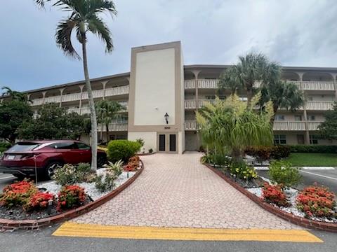 *PRICE REDUCTION!!!* Come enjoy this amazing Oasis in Coconut Creek. This gorgeous 2br, 2bth condo with amazing views of the Golf Course and Lake. Huge glassed enclosed patio to catch the morning sun. Freshly painted with newer black stainless-steel appliances. A/C and water heater replaced in 2019. New Safe Step Walk-in Tub installed 2020. Two huge walk-in closets, with extra storage unit on the same floor. The unit is steps away from the elevator and the parking you can see from the balcony. Wynmoor has a host of Amenities including a 900+ seat Theater, Fitness, Golf, tennis, Cafe on the Green, various clubs and some medical services. Also, there are several Pools to enjoy. Wynmoor is a 55+ community. Motivated Sellers!