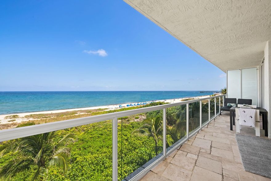Unique Boutique Oceanfront 32 unit Condominium.  Very quiet & highly secure building offering 24 hour valet services, gym and oceanfront pool and jacuzzi overlooking mangroves. This residence is unique with the elevator opening up into your own private foyer with a dedicated key fob that only the owner can access.  No hallways!  A fully renovated designer 2600 square feet 3 bedroom 2.5 bath corner unit is situated on the Atlantic Ocean with expansive balconies offering spectacular ocean and city views.  Split floorplan with Two Master Bedrooms and the third bedroom is dedicated as an office.  This residence has a spa like feel with many designer touches including private foyer with soothing fountains upon entering the front door, a soaking tub with ocean views