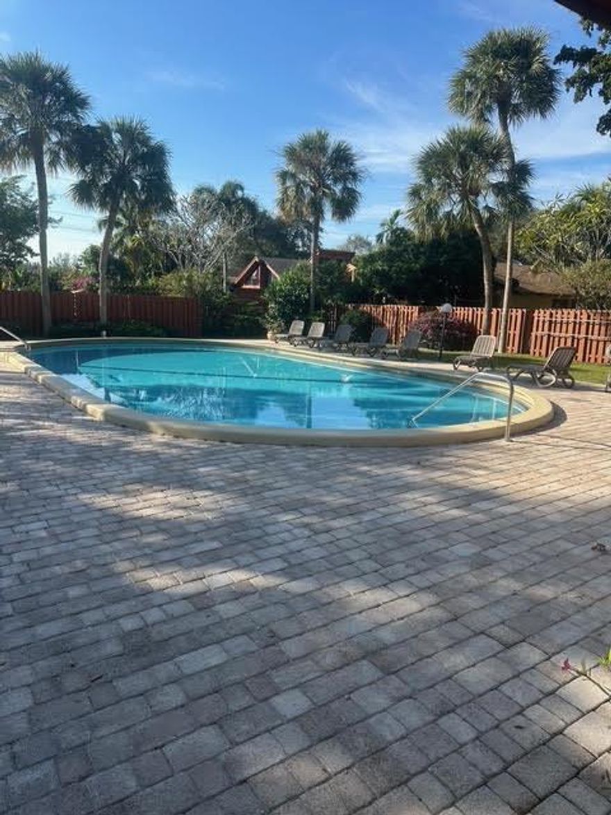 Beautiful & Spacious 2 Bedroom 2 Bath Townhouse with a Loft & located in the Sought after Lofts of Palm Aire Village. Enjoy Breakfast on the tranquil enclosed patio. The Vaulted Ceilings allow for an open feel throughout. New Washer/Dryer Large Master w/walk-in closet. Great fenced in yard Community has a Clubhouse/Pool. Tennis Court, Racquet Ball, Close to 2 dog parks, Turnpike, I-95 & Shopping Move Right in - 2 PARKING SPACES - Won't Last! Come See for yourself!