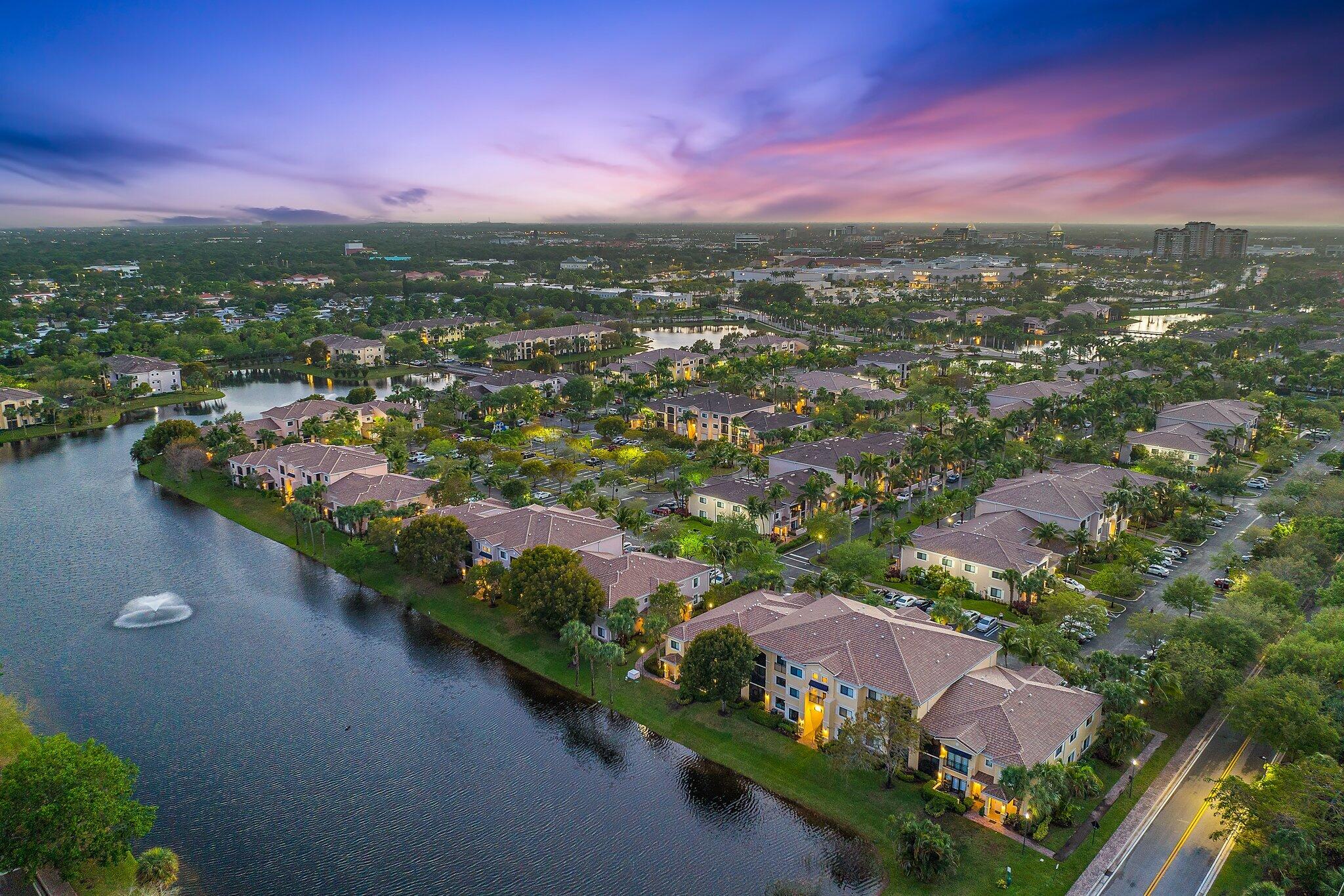 Immaculate Milan Model with Eastern sweet views of the lake and fountain...so Serene...laminate flooring and excellent condition. San Matera is the ideal address for those seeking the convenience of urban amenities combined with seclusion at home. This resort-style clubhouse has a fitness center, meeting and conference rooms with bar and fireplace. San Matera's outdoor sports and recreation facility features a swimming pool, sundeck and Jacuzzi, tennis and racquetball courts. All this and walk to the Gardens Mall and the Downtown at the Gardens which offers an experience like no other. Immerse yourself in lush, tropical surroundings