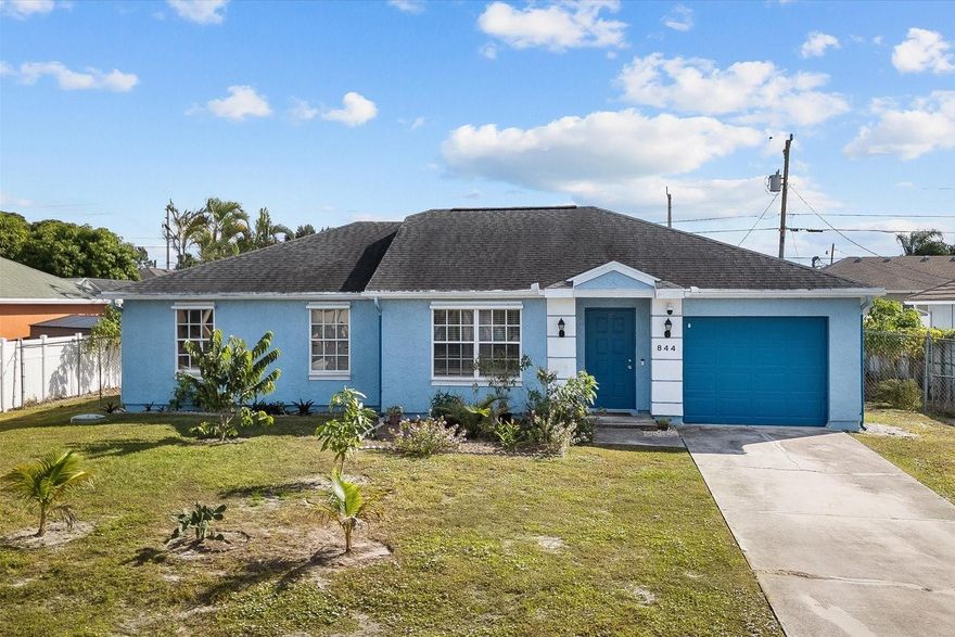 Discover the perfect opportunity to make Port St. Lucie your next home. This well-kept 3-bedroom, 2-bath property offers spacious bedrooms, vaulted ceilings, abundant natural lighting, and a recently updated water heater. With no HOA, you’ll enjoy flexibility and freedom in how you use your property. The fully fenced backyard is a true blank canvas—open space, fruit trees, and plenty of room to design your ideal outdoor retreat, highlighting the best of Florida living. Conveniently located near I-95 and right off Becker Road, commuting is quick and easy, with West Palm Beach only about 40 minutes away. Information deemed reliable but not guaranteed.
