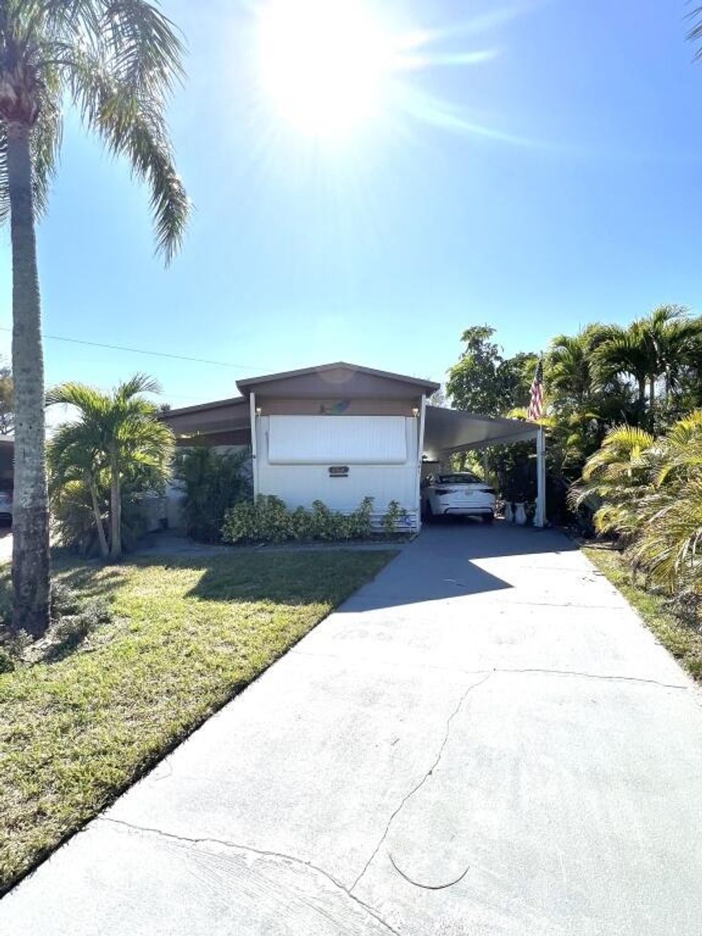 Photo of 341 NE Tiare Place, Jensen Beach, FL 34957 (MLS # R10964113)