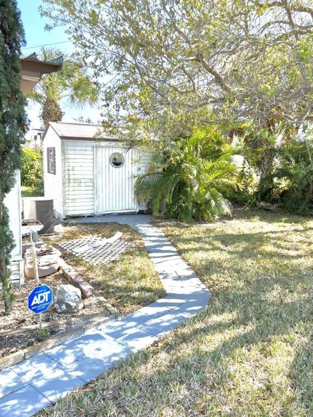 Photo of 341 NE Tiare Place, Jensen Beach, FL 34957 (MLS # R10964113)
