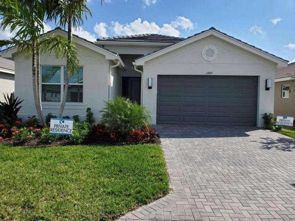 Photo of 11869 SW Jasper Lake Way, Port Saint Lucie, FL 34987 (MLS # R10672696)