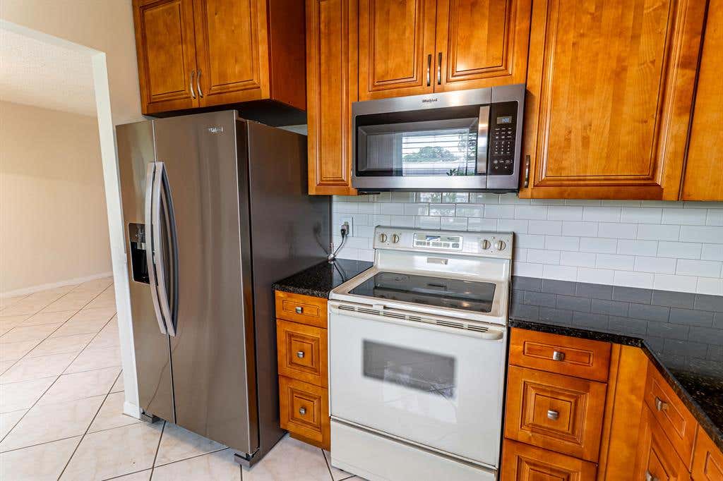 Photo of 500 Holyoke Lane Ln, Lake Worth Beach, FL 33467 (MLS # R10721497)
