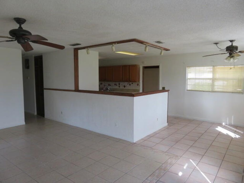 Photo of 134 NW Peach Street, Port Saint Lucie, FL 34983 (MLS # R10955570)