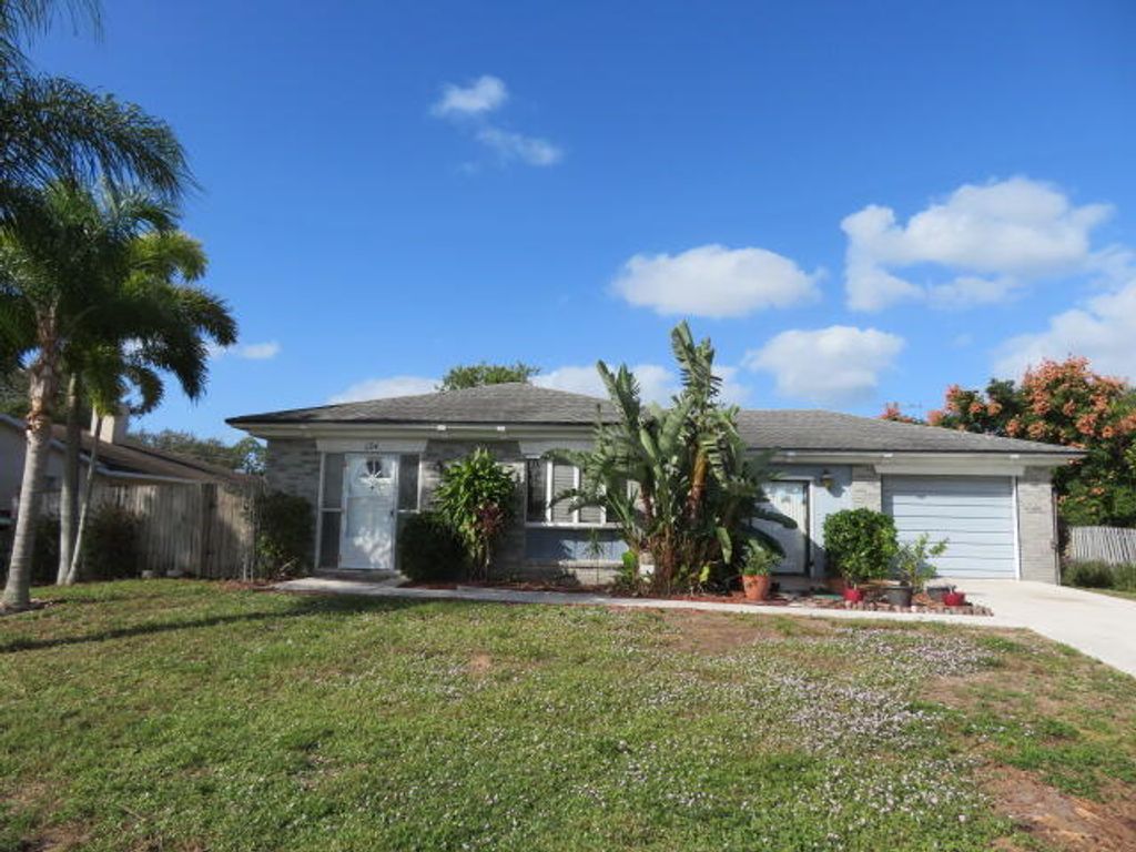 Photo of 134 NW Peach Street, Port Saint Lucie, FL 34983 (MLS # R10955570)