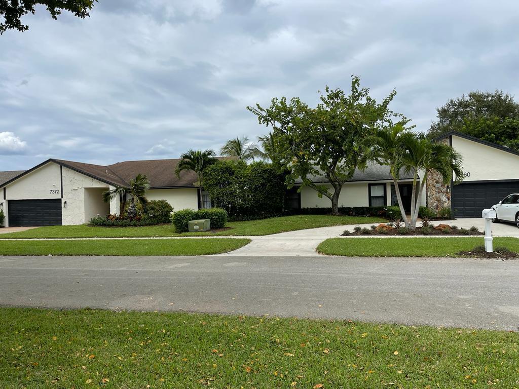 Beautiful vacation style fully furnished three bedroom home in the hear of Boca Raton. Open air floor plan creates a light and bright environment. Kitchen and bathrooms beautifully done. Outdoor living space with heated pool and lovely pergola. Great for entertaining. Close to shopping, restaurants and house of worship. MUST SEE!!! Come check out this amazing home.