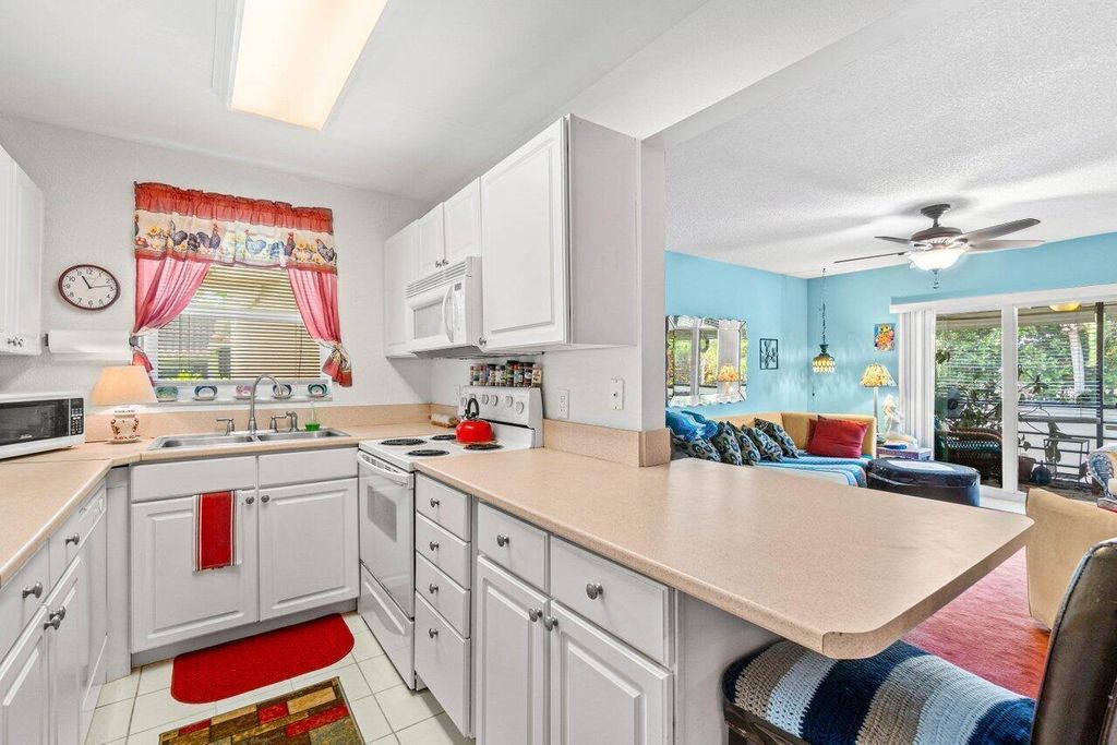 Photo of 1124 NW 13th Street #204a, Boca Raton, FL 33486 (MLS # B26009811)